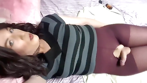 Shemale shows off her pussy and masturbates with dildo