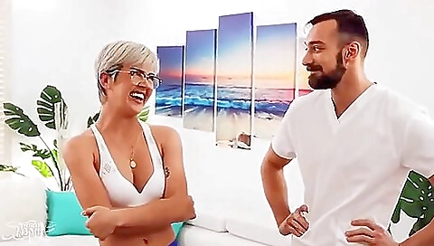 A blonde shemale and a guy get their big breasts fucked in reverse