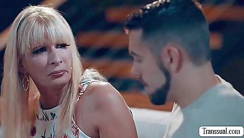 A big tits blonde is getting her ass fucked by a large dick