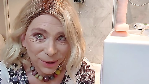 Amateur blonde milf in stockings gets a dildo in anal hole