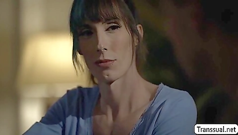 Buxom tattooed transvestite with a huge cock enjoys fucking